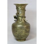 Chinese brass vase of baluster form with incised panels of figures, precious things and moulded