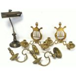 Pair of 18th century cast brass candle wall sconces with pierced lyre backs, each with twin