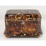 Georgian tortoiseshell tea caddy of canted rectangular form with inlaid white metal stringing,