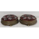 Pair of Victorian circular foot stools with floral beadwork and tapestry tops, each 31cm diam.  (2).