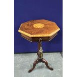 19th century walnut and mahogany marquetry inlaid sewing table, the octagonal top decorated with a