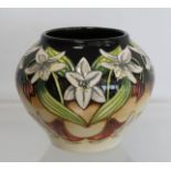 Modern Moorcroft Pottery "Scrambling Lily" pattern vase of squat globular form, designed by Anji