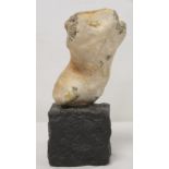 Anthropomorphic sculpture created from a flint rock resembling a human torso, mounted on black