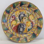 19th or early 20th century Italian pottery circular charger with incised polychrome decoration,