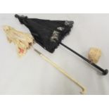 Victorian black satin parasol with lace edging, cream silk lining and ebonised tapered handle and