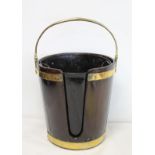 Late 18th century Irish mahogany brass bound plate bucket of tapered coopered form with swing handle