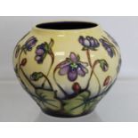 Modern Moorcroft Pottery "Ashwood Hepatica" pattern vase of squat globular form, designed by Emma