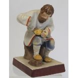 Russian Moscow/Gardner bisque porcelain figure of a seated man braiding lapti (bast shoes).
