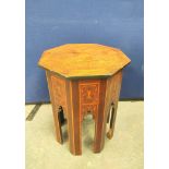 Late 19th century Eastern style inlaid octagonal occasional table with floral parquetry.