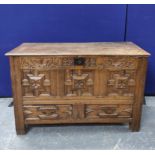 William & Mary oak coffer, with a carved panelled front, bearing inscription ER and dated 1696, with