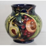 Modern Moorcroft Pottery "Queen's Choice" pattern vase of squat baluster form, designed by Emma