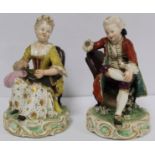 Pair of 19th century porcelain figures of a seated boy reading a book and girl tatting, in 18th