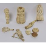 Two 19th century carved bone torsos (possibly snuff bottles) of a woman in a dress with lace bodice,