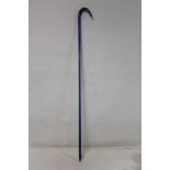 Victorian blue glass walking stick of plain form with curved handle, 96cm long.