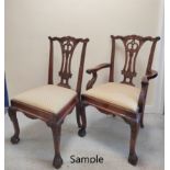 Set of eight good reproduction mahogany dining chairs, including two carvers, in the Chippendale