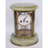 Green onyx four glass mantel clock, the twin train dial with Arabic numerals, mercury-driven