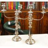 Pair of Old Sheffield plated two-branch three-light candelabra with gadrooned sconces upon