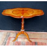 19th century inlaid walnut occasional table, the snap action shaped tilt top decorated with a