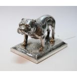 Silver table model of a bulldog by TW Dobson 1902, upon rectangular loaded base, 95mm long.