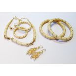 Pair of Indian filigree gold drop earrings, '960', 6g, and various similarly mounted ivory items.