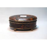Tortoiseshell oval bijouterie box with silver tied reed edges and mounts, 1920, 17.5cm.