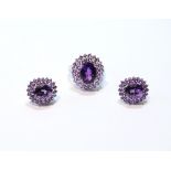 Amethyst oval cluster ring, in white gold, '14k', with matching earrings.  (3)