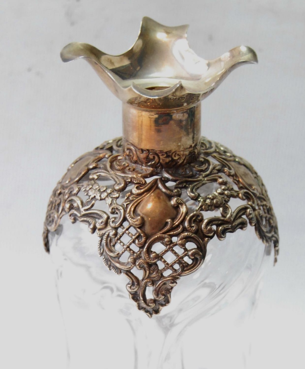 Glass 'glug glug' decanter by Henry Mathews, Birmingham 1897, with pierced and embossed silver - Image 2 of 3