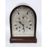 Continental mahogany-cased mantel clock, the silvered dial with Roman numerals, chime, silent,