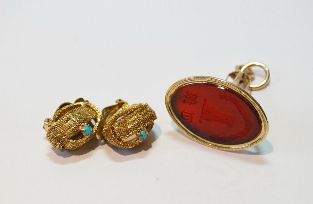 Georgian gold watch fob seal with oval crested and initialled carnelian, c. 1810, and a pair of gilt