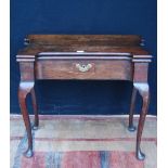 18th century and later Irish-style mahogany card table with a shaped fold-over top enclosing a later