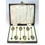 Set of six silver and polychrome enamel coffee spoons with bean terminals, Birmingham 1939, cased.
