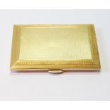 Lady's 18ct gold cigarette case by The Goldsmiths & Silversmiths Co., 1928, engine turned with