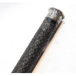 Late 19th century Anglo-Indian carved ebony walking stick with foliate decoration and flat white