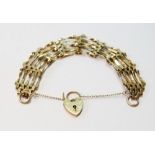 9ct gold gate bracelet with padlock, 10.8g.