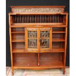 Shapland & Petter of Barnstaple fine Arts & Crafts walnut motto bookcase, the shelved gallery with a