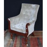 Victorian mahogany library armchair upholstered in later button-back velour, with a scroll frame