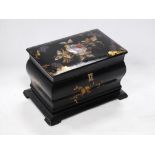 Victorian black papier mâché tea caddy, the hinged top enclosing two fitted compartments with a