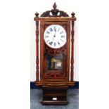 Late Victorian walnut marquetry drop dial wall clock with a twin train dial, 104cm high.