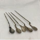 Roman- Five late Roman copper alloy Cochlearium spoons with tapered handles and shallow bowls. Two