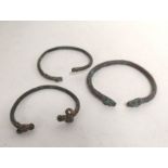 Roman. Three Roman graduated bronze bangles with rams head terminals. Circa 3rd century AD (3)