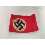 WW2 era Nazi Germany armband constructed of red felt with embroidered swastika. A.F