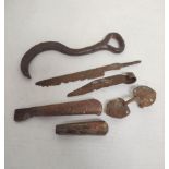 collection of medieval to post medieval wrought iron tools to include a medieval iron bale hook, two