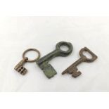 Roman/Byzantine. Two late Roman keys one of bronze contruction the other of wrought iron. To include