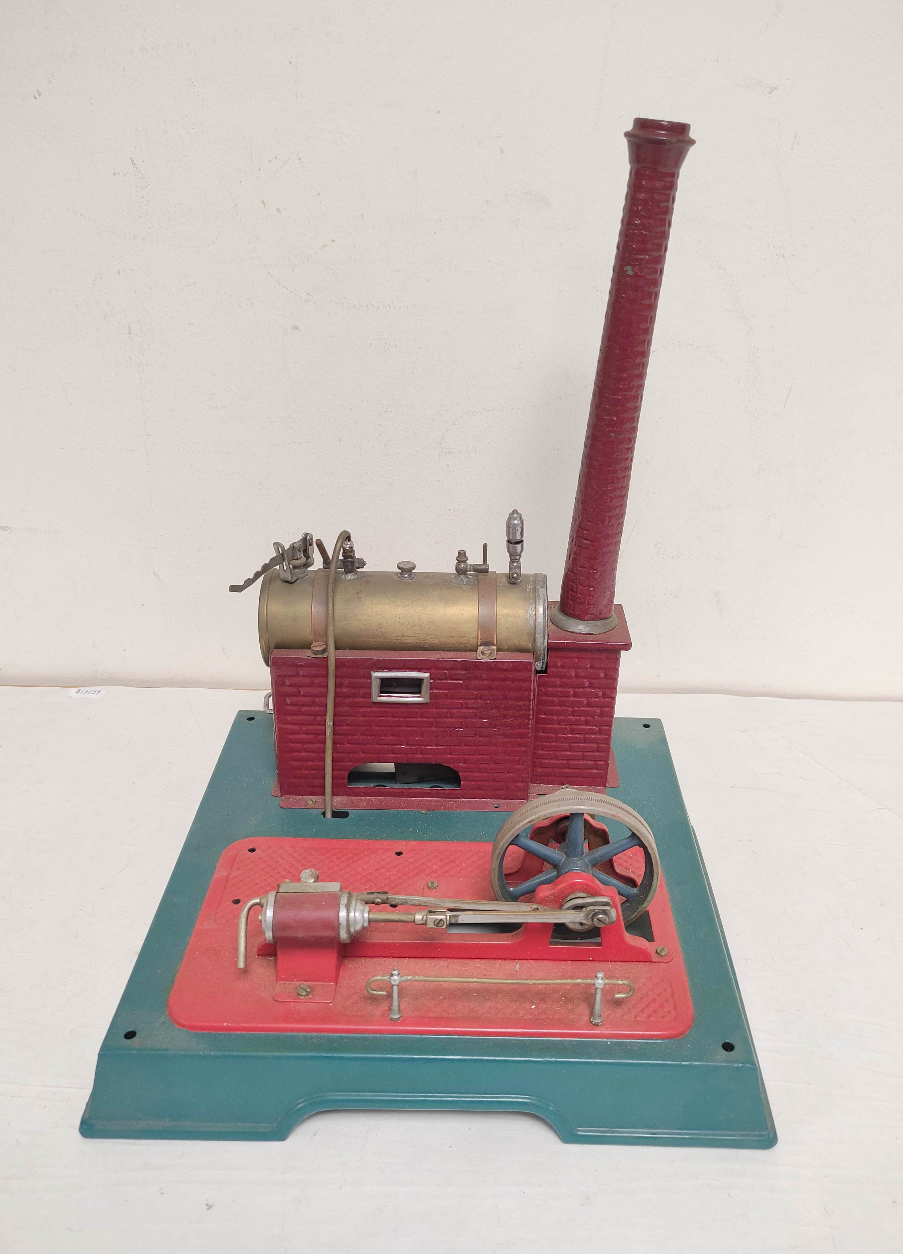 Vintage German Marklin model 4095 horizontal stationary steam engine of die cast construction.