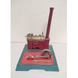 Vintage German Marklin model 4095 horizontal stationary steam engine of die cast construction.