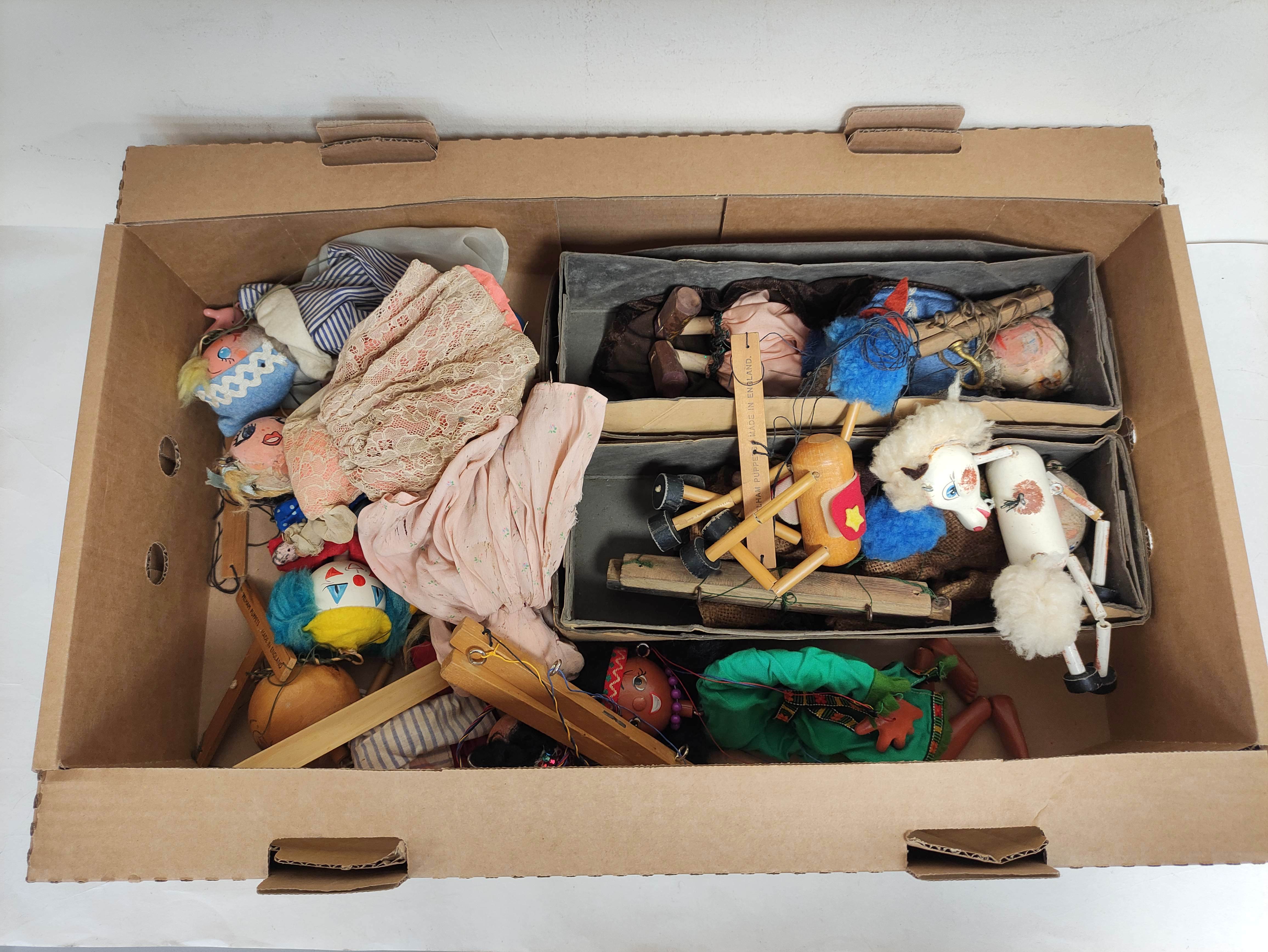 Box containing a large quantity of 1950s/60s Pelham Puppets to include Horse etc. Most heavily