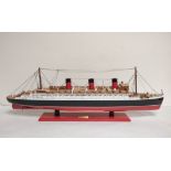 Wooden painted model ship of RMS Queen Mary. Approximately 81cm in length.