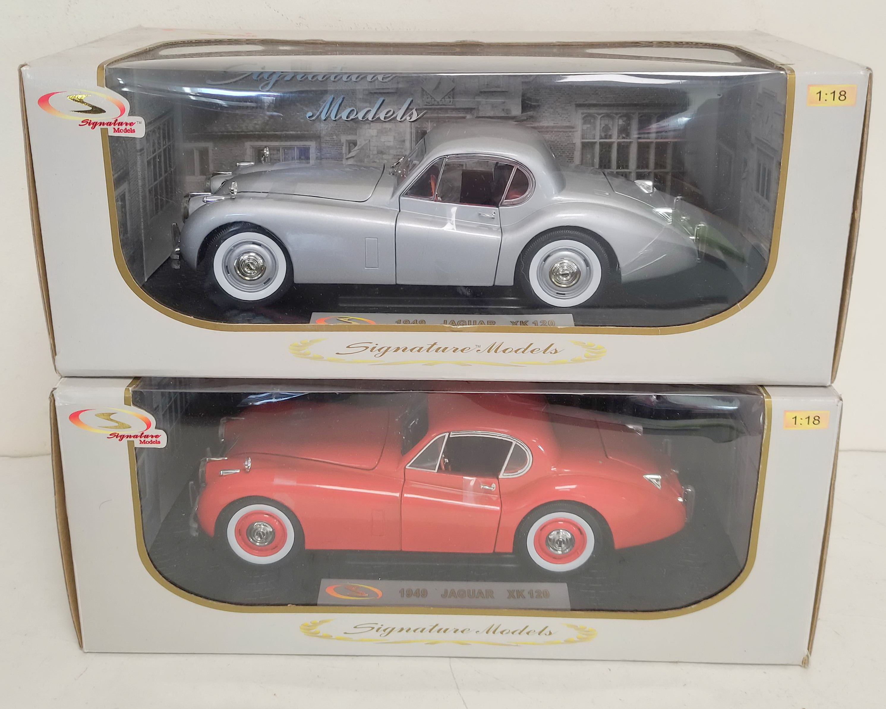 Two Signature Models 1:18 scale boxed die cast model vehicles. To include a 1949 Jaguar XK120 in