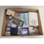 Box containing a large collection of commemorative and collector's coins to include a Falkland