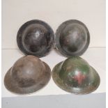 Four British WW2 brodie helmets all lacking liners (4)